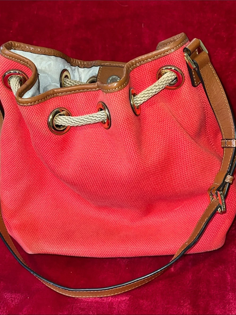Michael Kors Coral with Brown Trim Tassel Drawstring Shoulder Bag